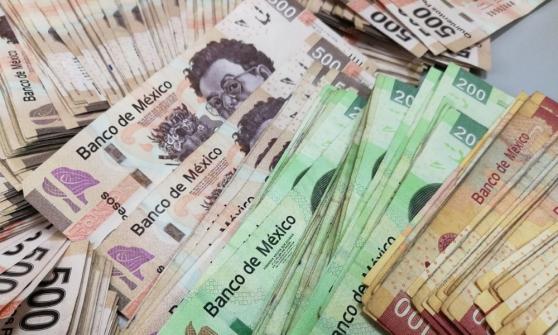 Peso recupera terreno ante el dólar previo a testimonio del presidente de la Fed