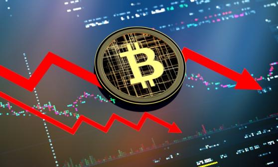 Bitcoin desvanece avance y vuelve a caer por debajo de 30,000 dólares